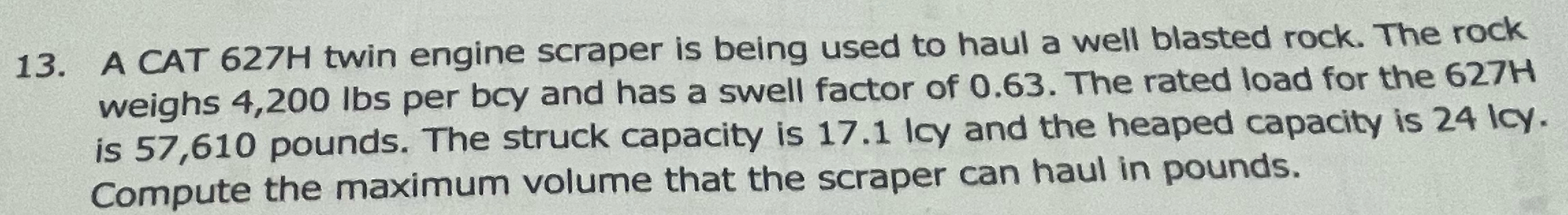 A CAT 6 2 7 H twin engine scraper is being used