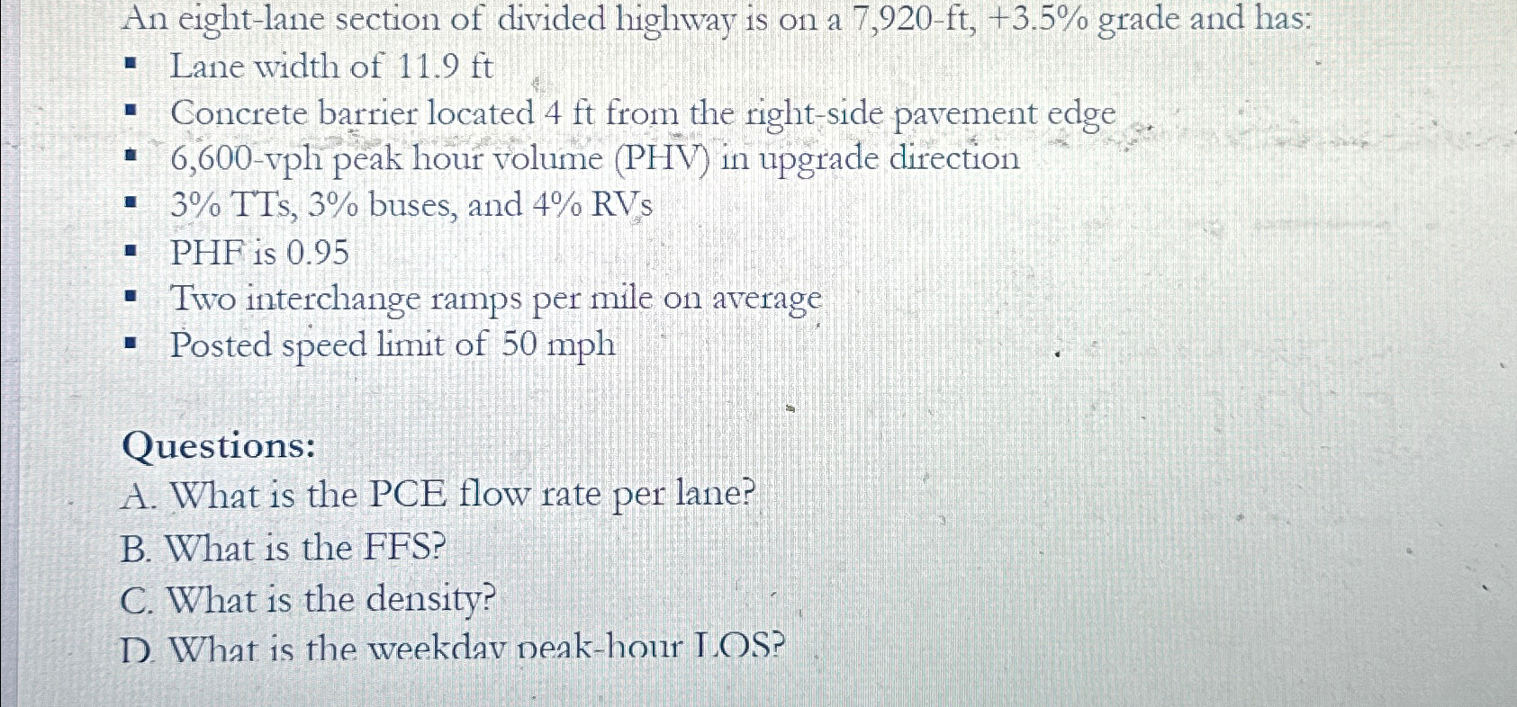 An eight - lane section of divided highway is on