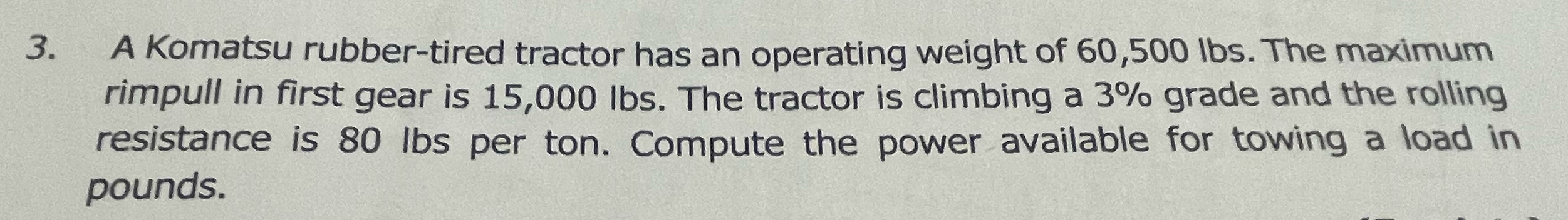 A Komatsu rubber - tired tractor has an operating