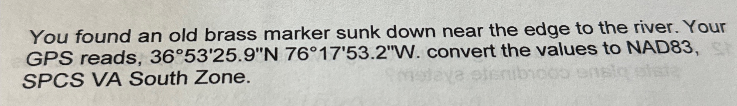 You found an old brass marker sunk down near the