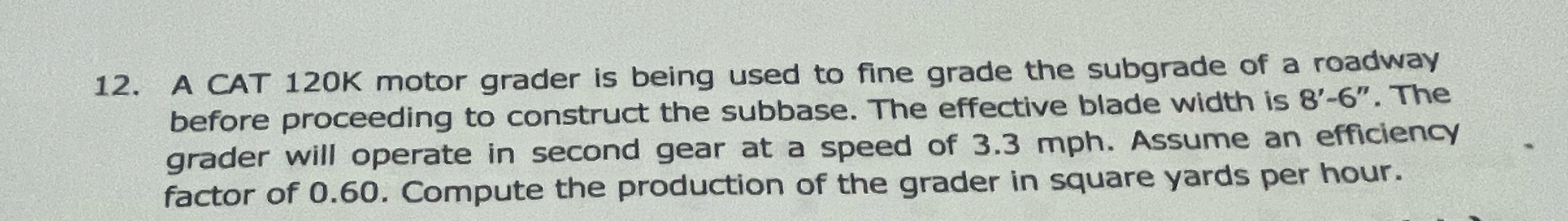 A CAT 1 2 0 K motor grader is being used to fine