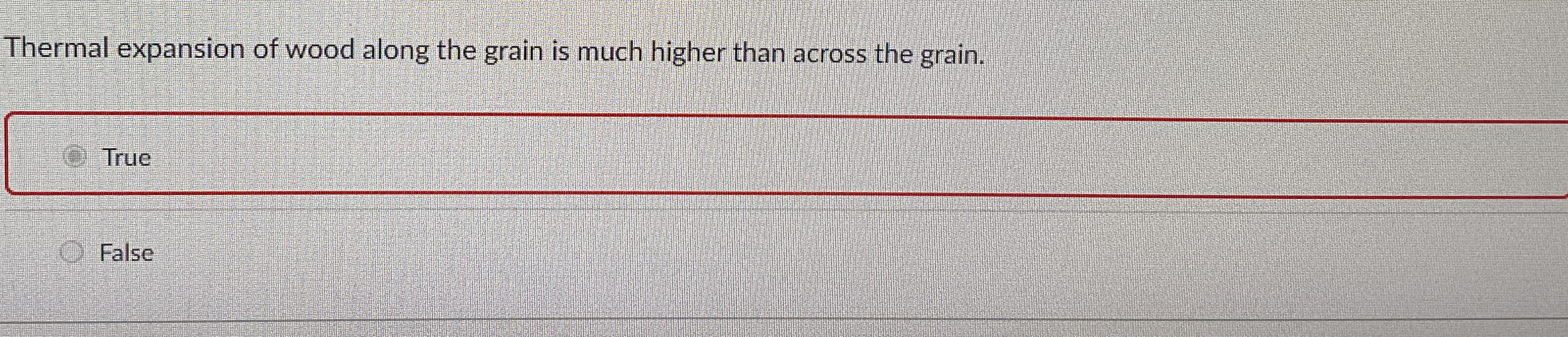 Thermal expansion of wood along the grain is much
