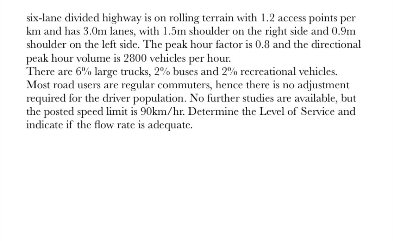 six - lane divided highway is on rolling terrain