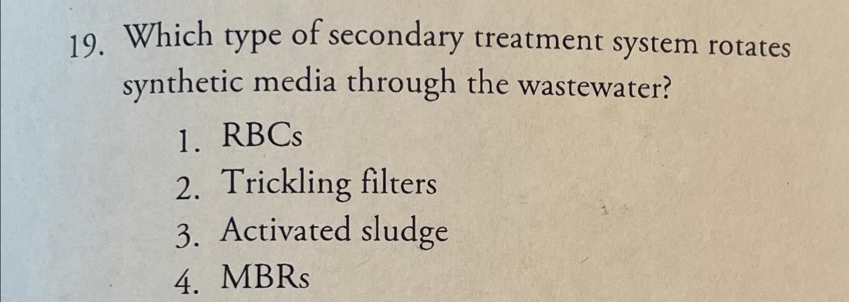 Which type of secondary treatment system rotates