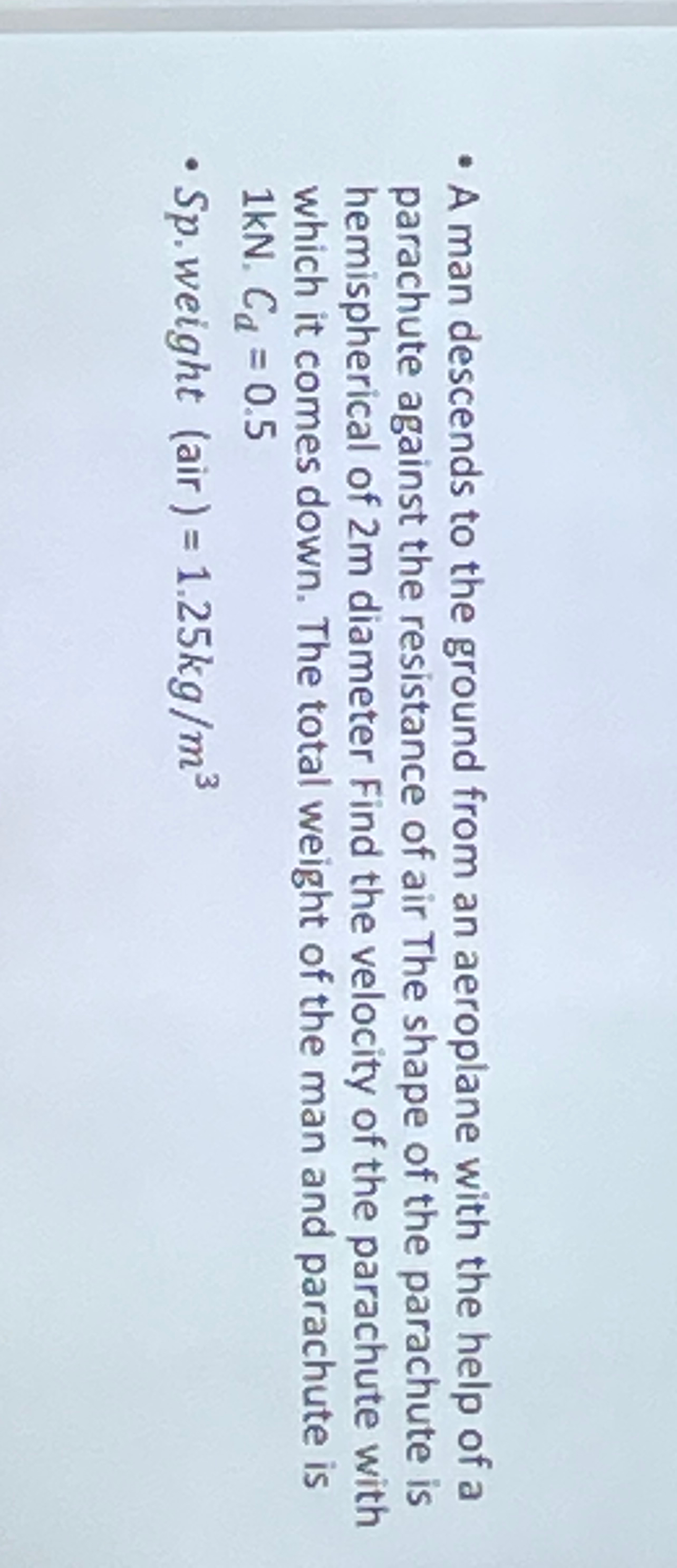 A man descends to the ground from an aeroplane