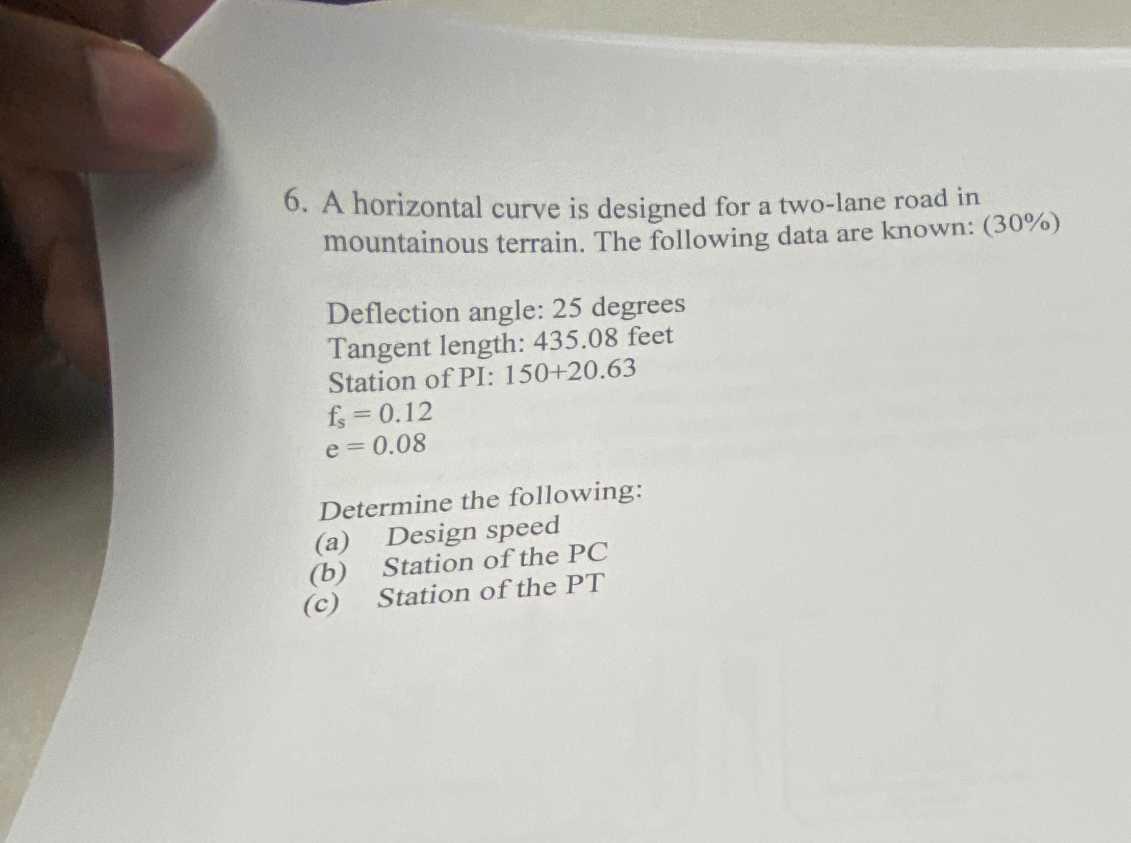 A horizontal curve is designed for a two - lane