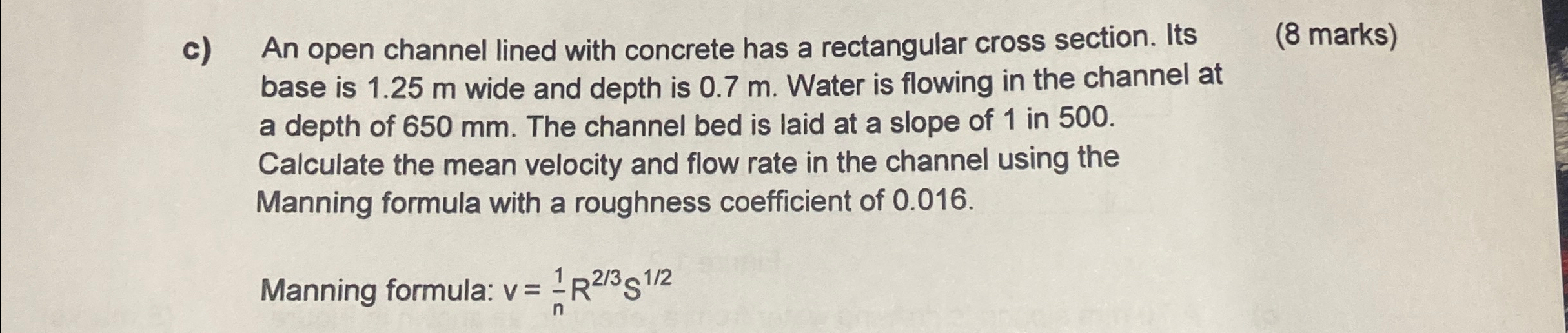 c ) An open channel lined with concrete has a