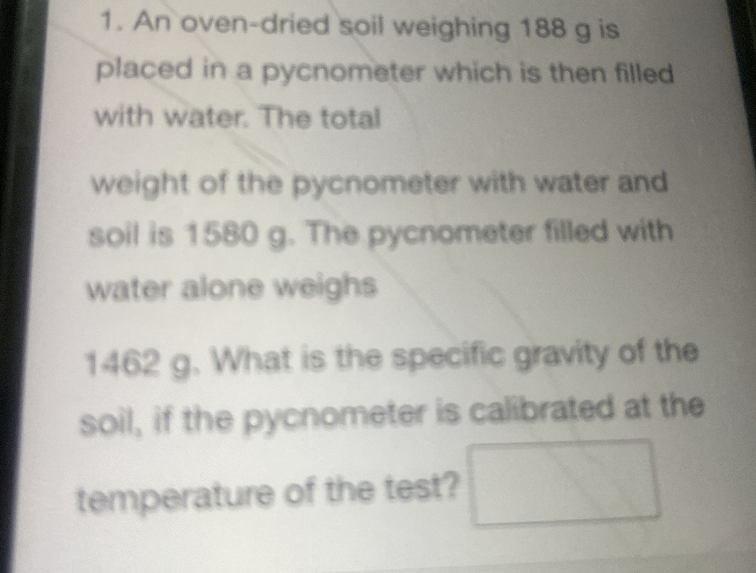 An oven - dried soil weighing 1 8 8 g is placed