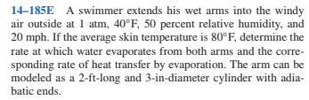 1 4 - 1 8 5 E A swimmer extends his wet arms into
