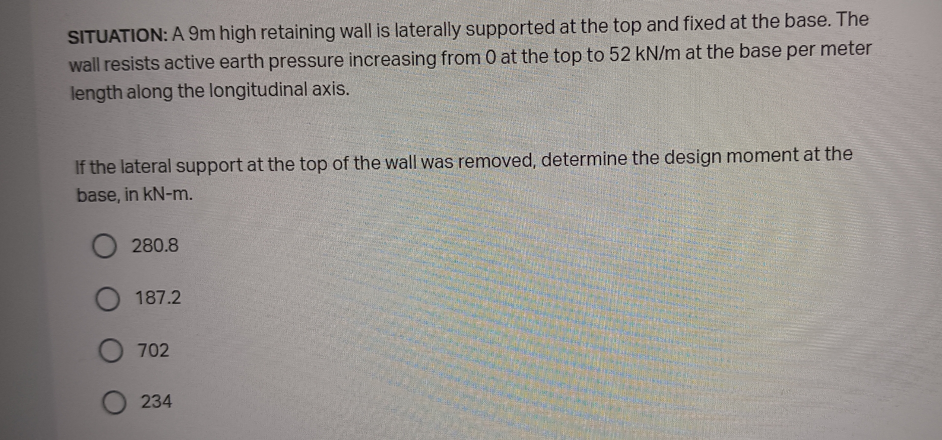 SITUATION: A 9 m high retaining wall is laterally