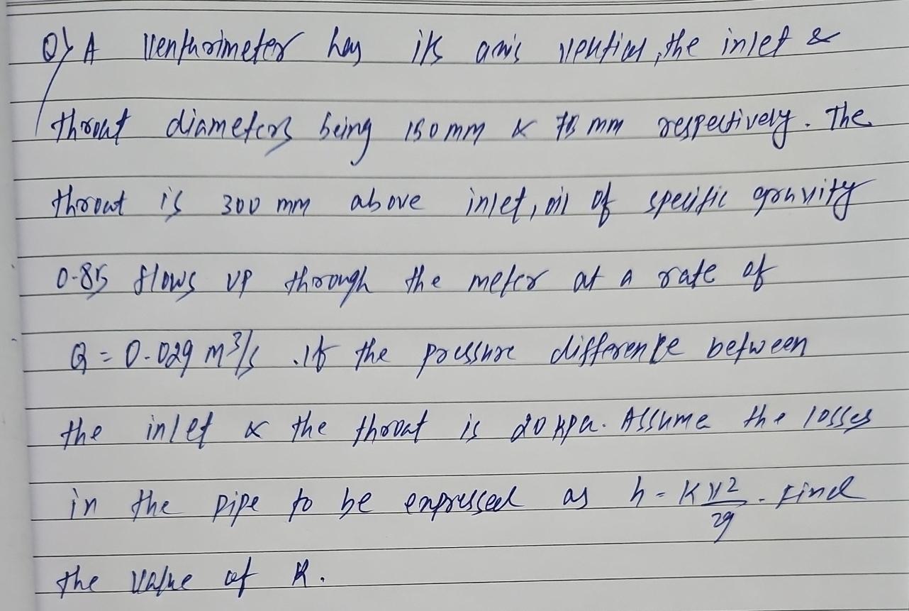 Q ) A venturimeter has its axis vertical, the