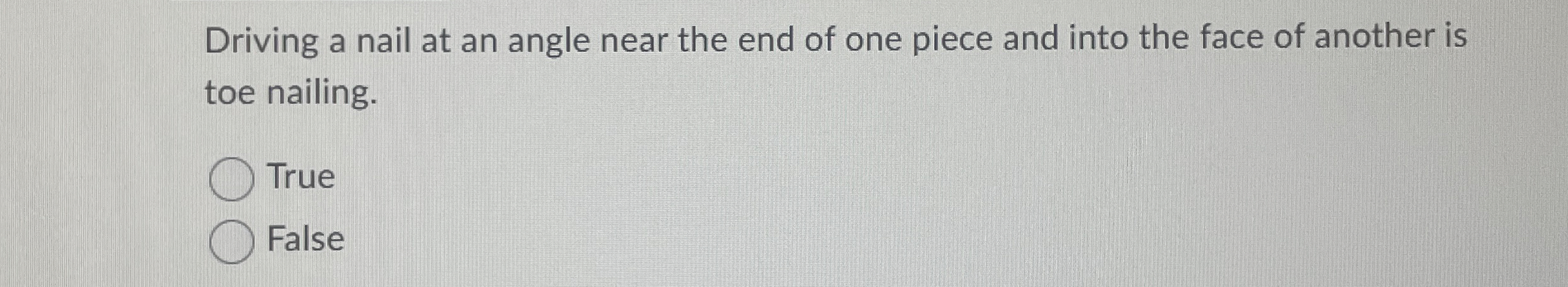 Driving a nail at an angle near the end of one