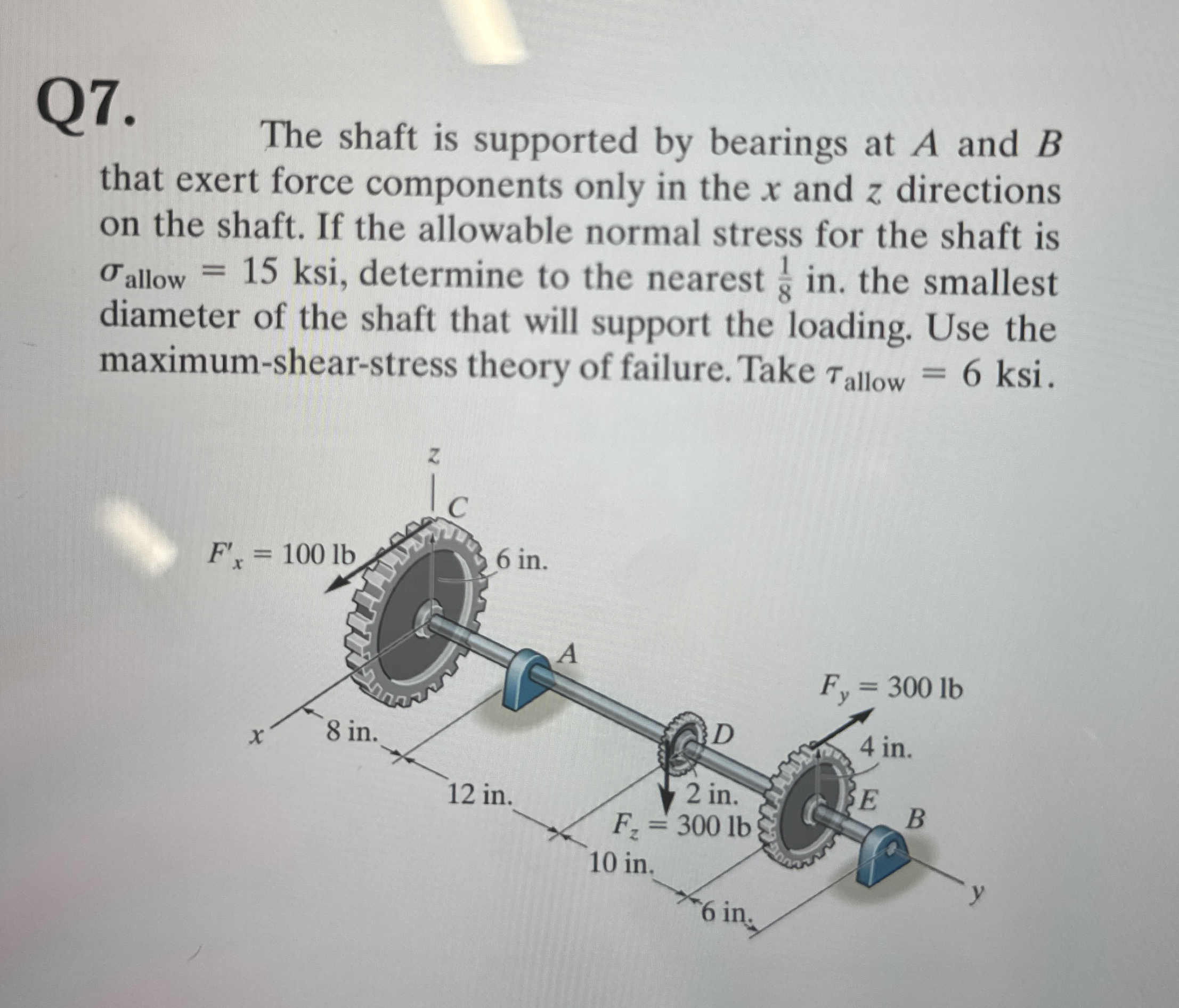 Q 7 . The shaft is supported by bearings at A and
