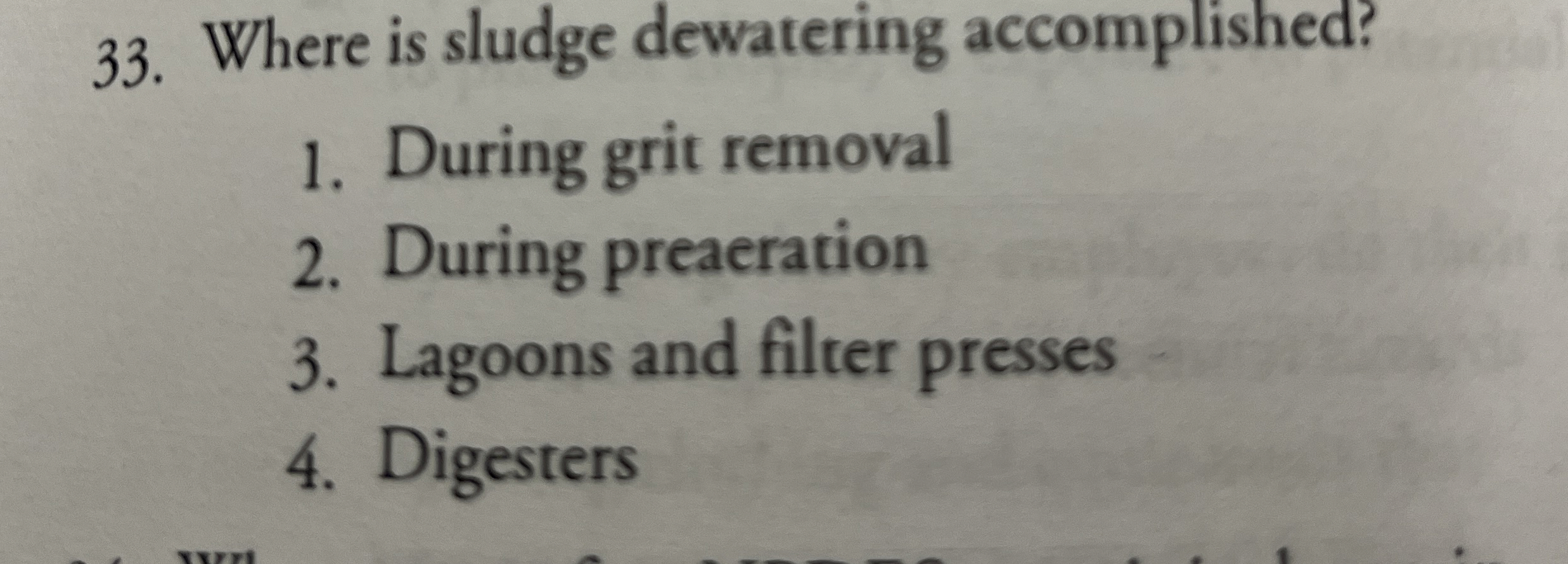 Where is sludge dewatering accomplished? During