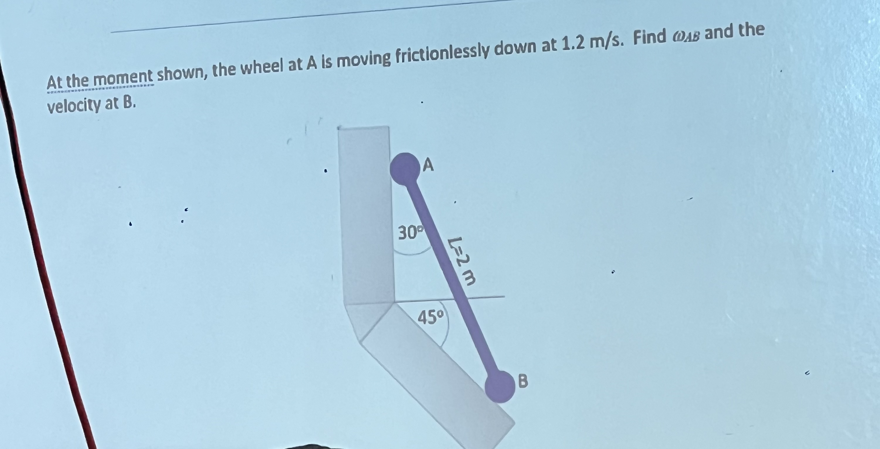 At the moment shown, the wheel at A is moving