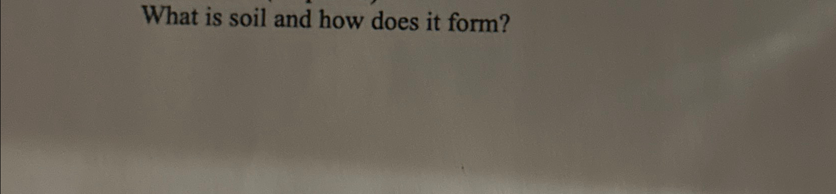 What is soil and how does it form?
