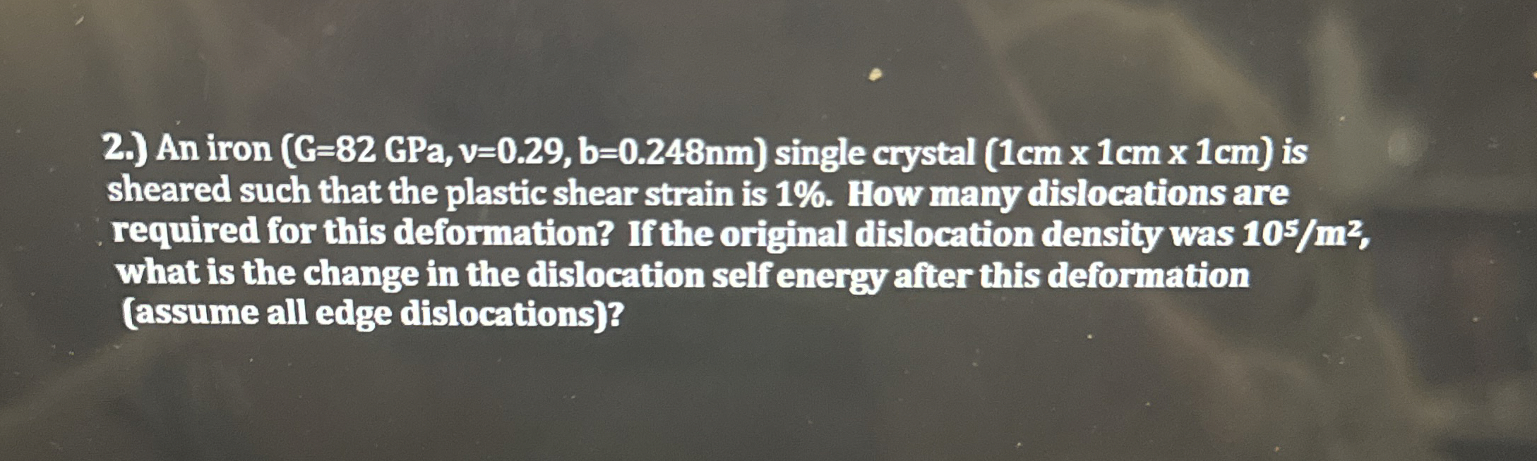 2 . ) An iron ( G = 8 2 GPa, v = 0 . 2 9 , b = 0