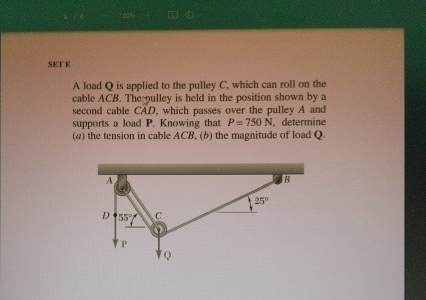 SETE A load Q is applied to the pulley C , which