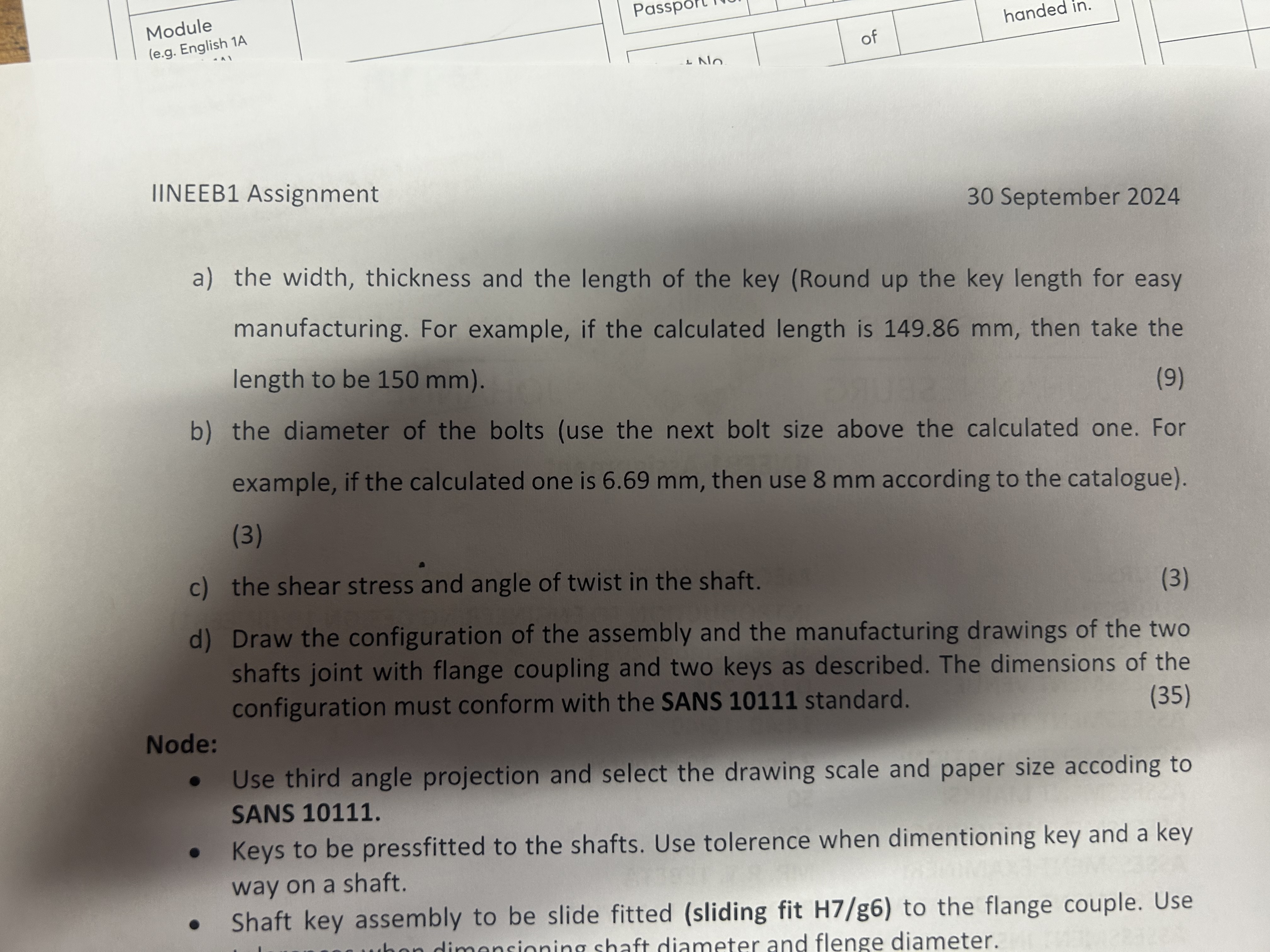 Question 1 A flange coupling between two solid
