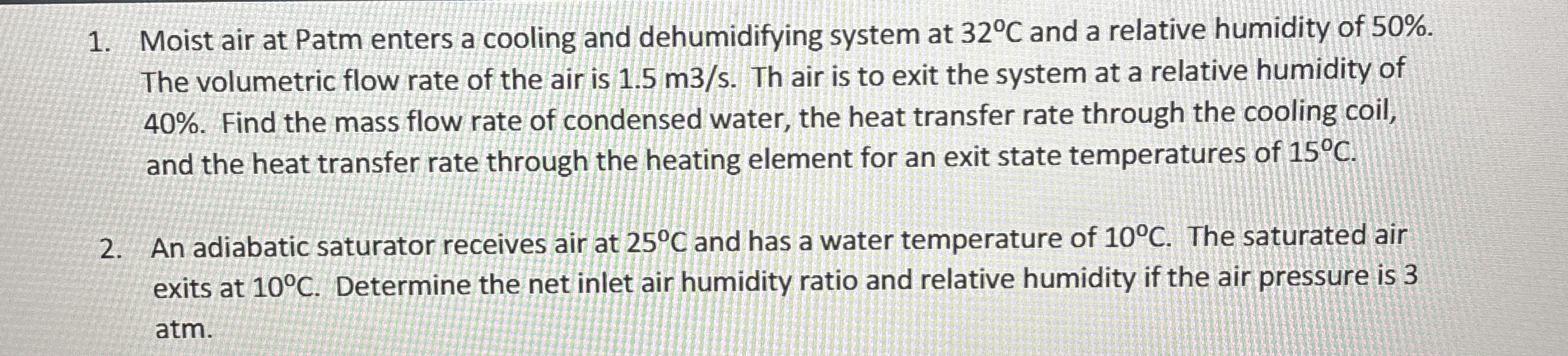 Moist air at Patm enters a cooling and