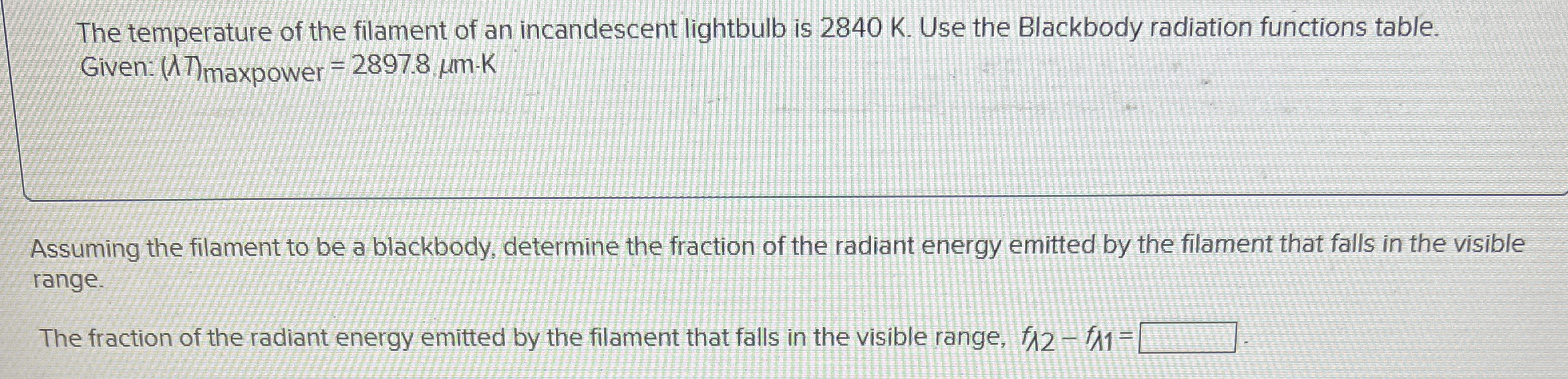 The temperature of the filament of an