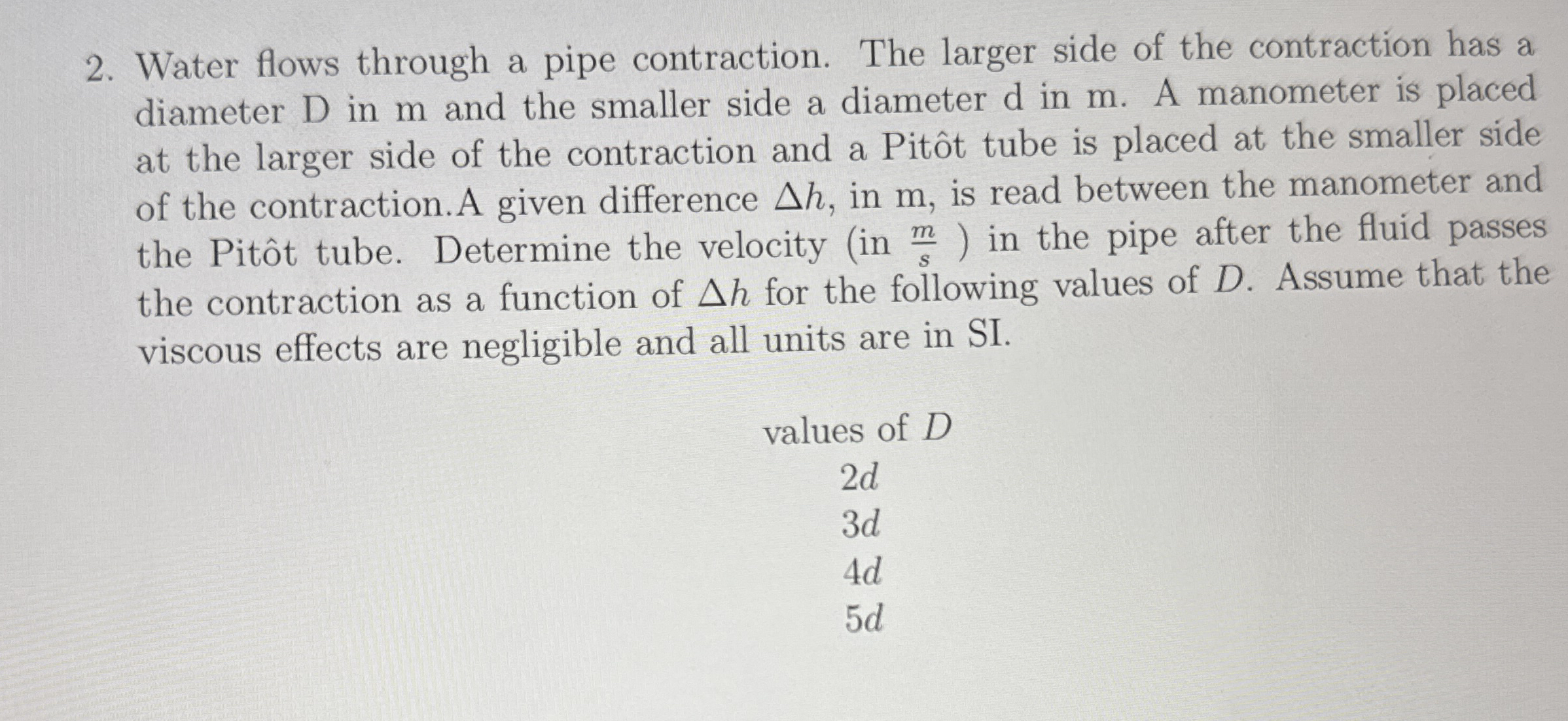 Water flows through a pipe contraction. The