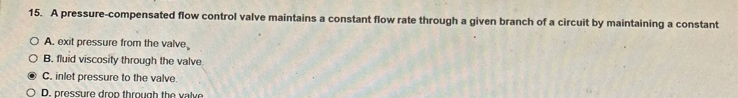 A pressure - compensated flow control valve