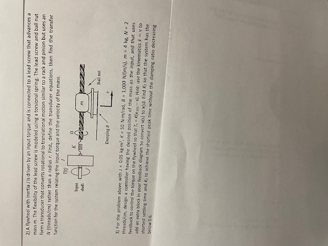 A flywheel with inertia J is driven by an input