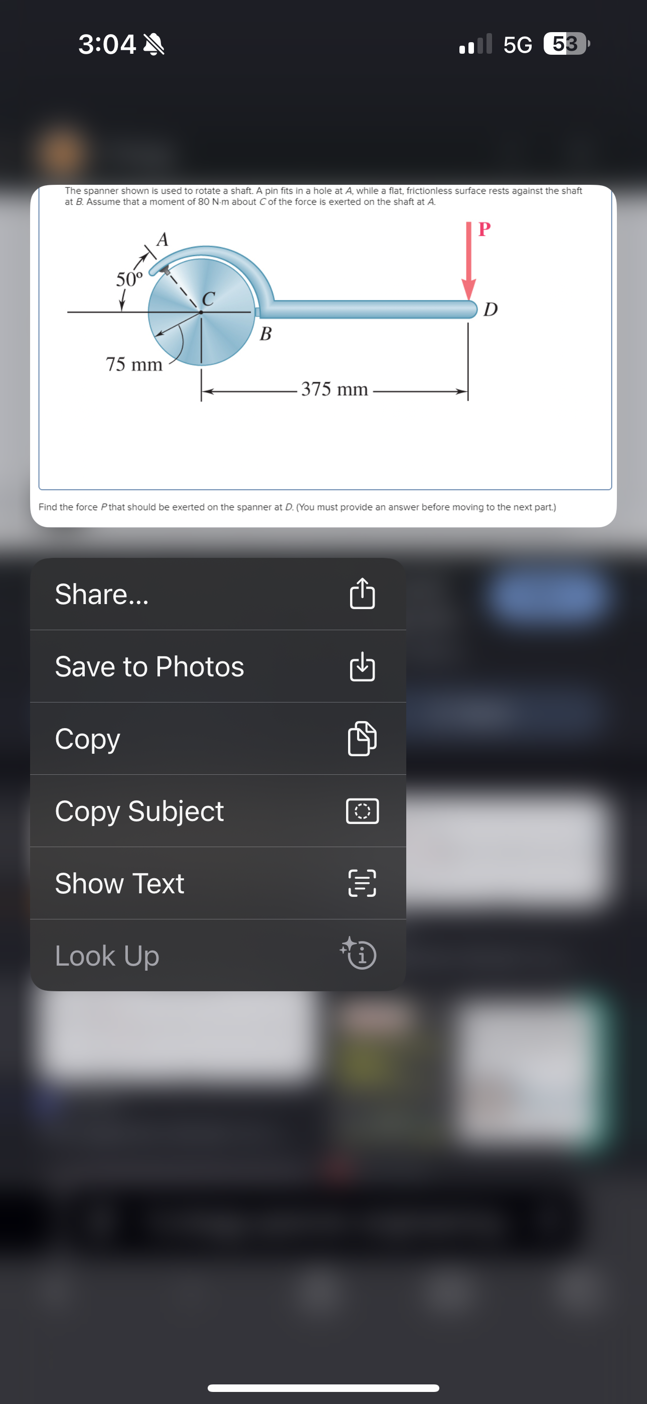 The spanner shown is used to rotate a shaft. A
