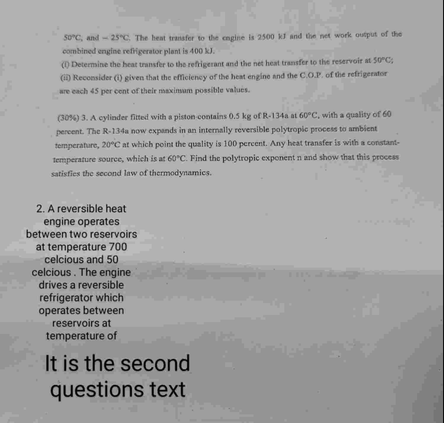 2 . A reversible heat engine operates between two