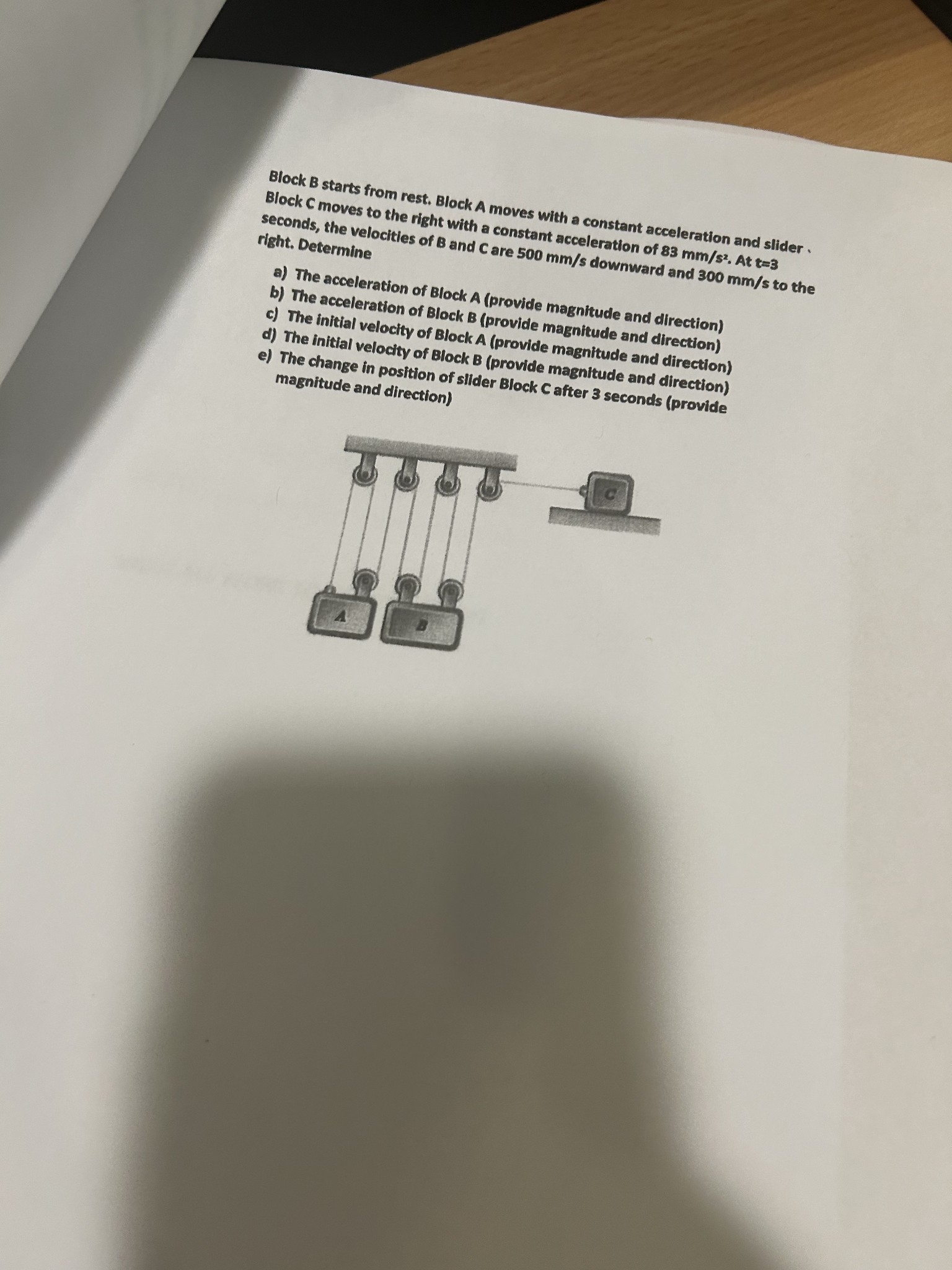 Block B starts from rest. Block A moves with a