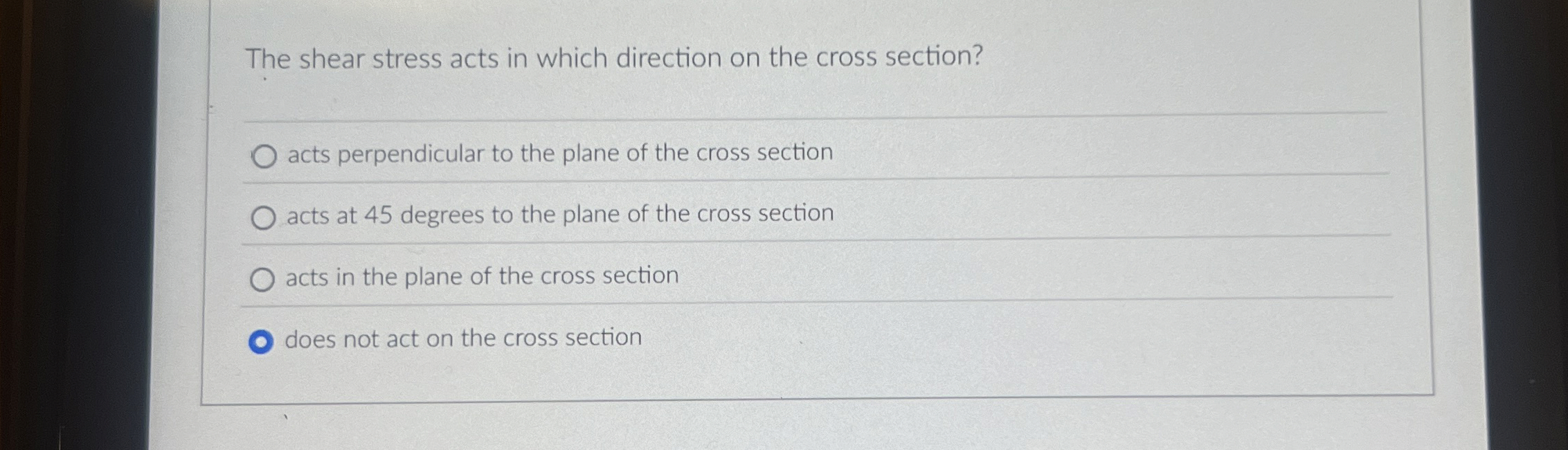The shear stress acts in which direction on the