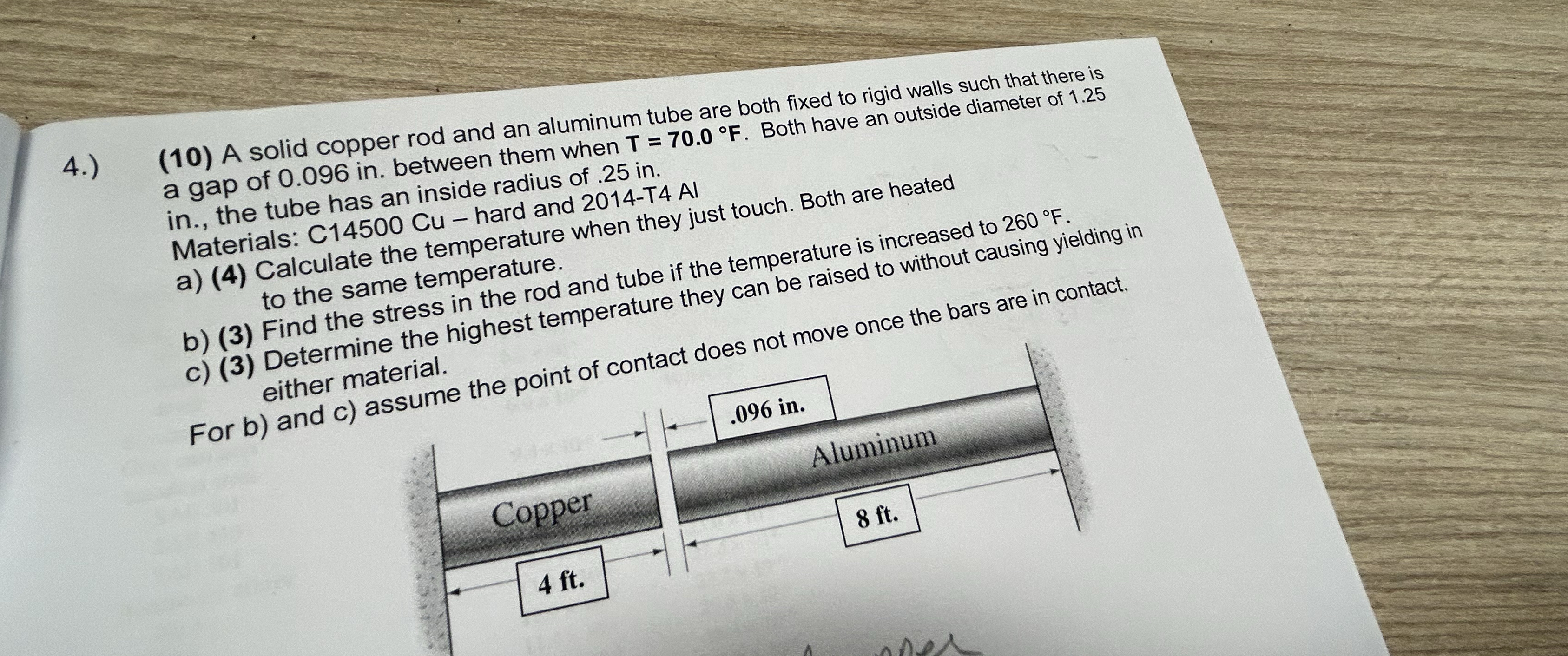 4 . ) ( 1 0 ) A solid copper rod and an aluminum