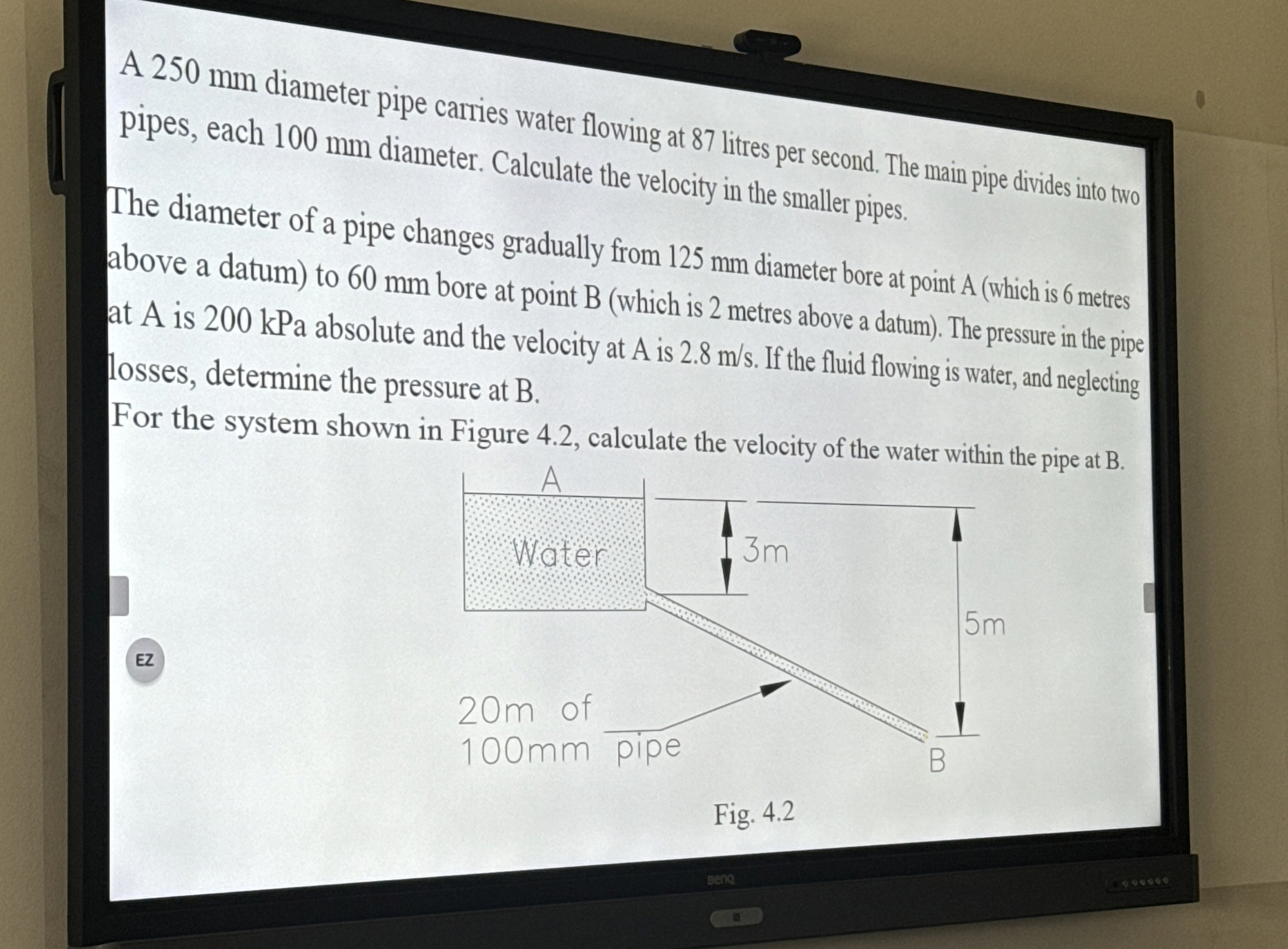 A 2 5 0 mm diameter pipe carries water flowing at