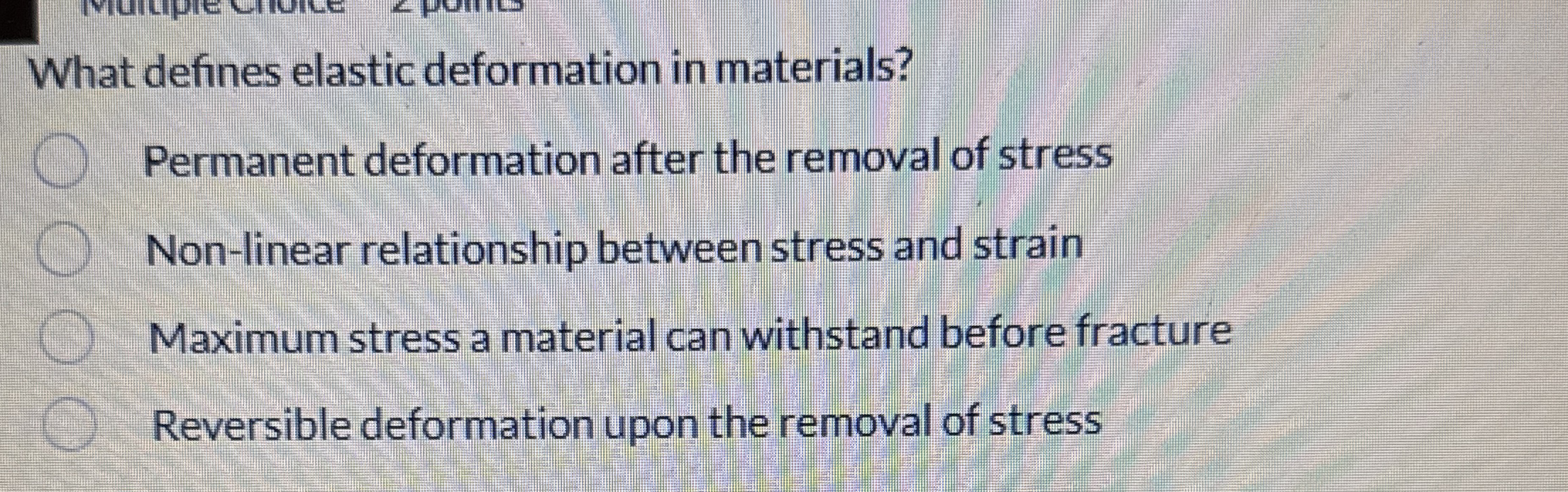 What defines elastic deformation in materials?