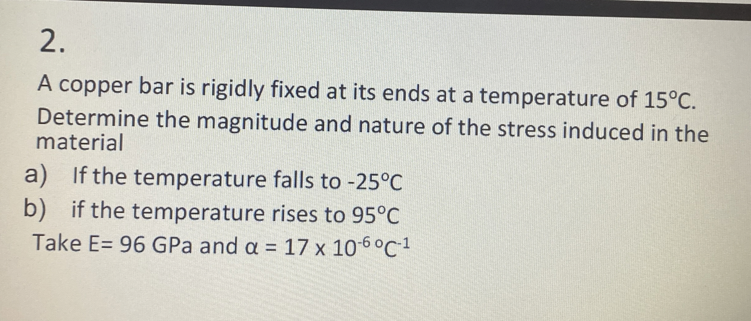 A copper bar is rigidly fixed at its ends at a