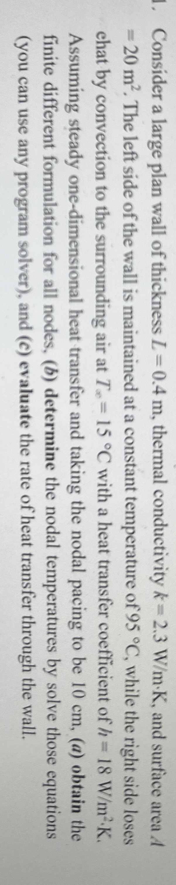 Consider a large plan wall of thickness L = 0 . 4