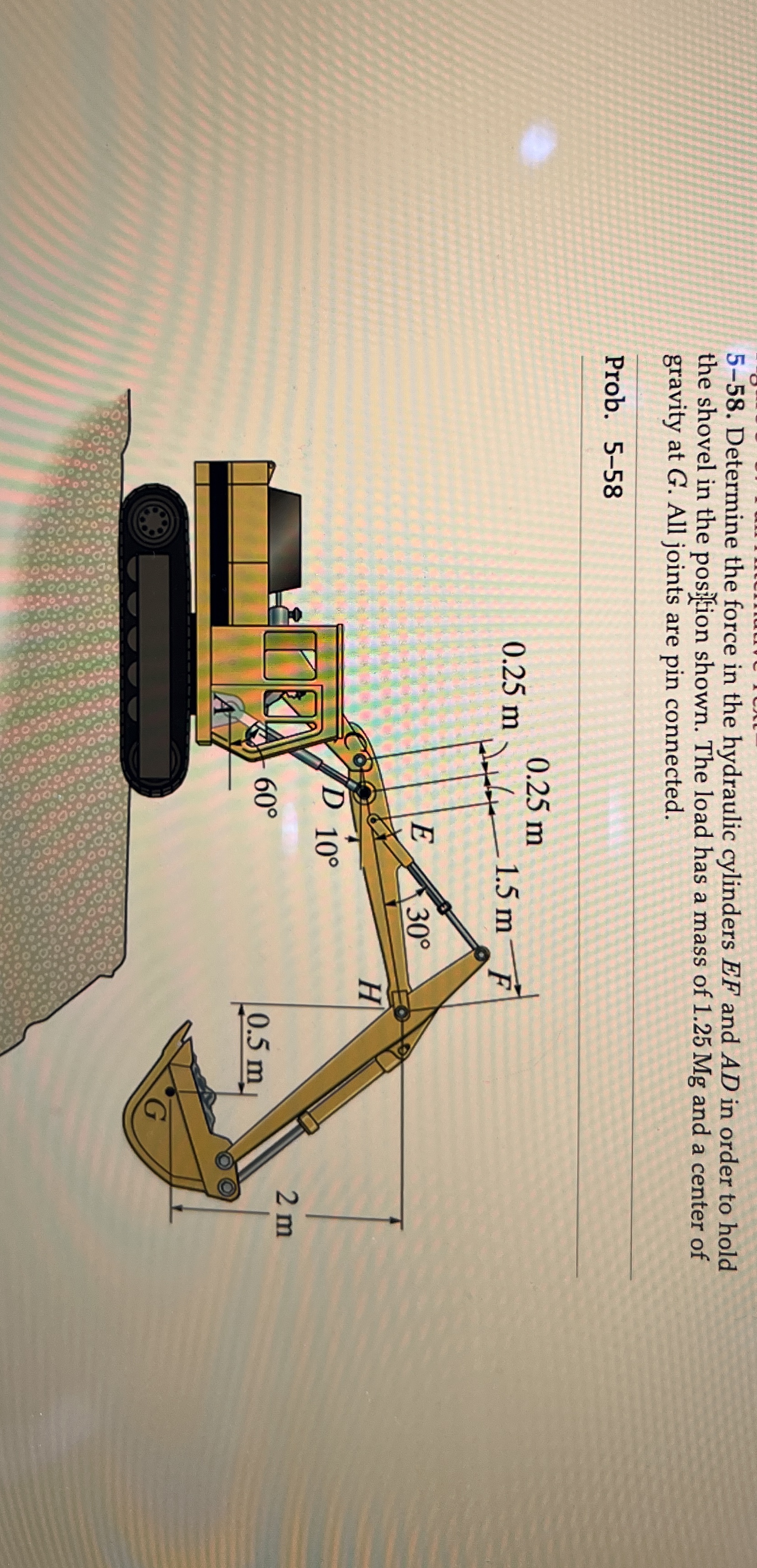 5 - 5 8 . Determine the force in the hydraulic