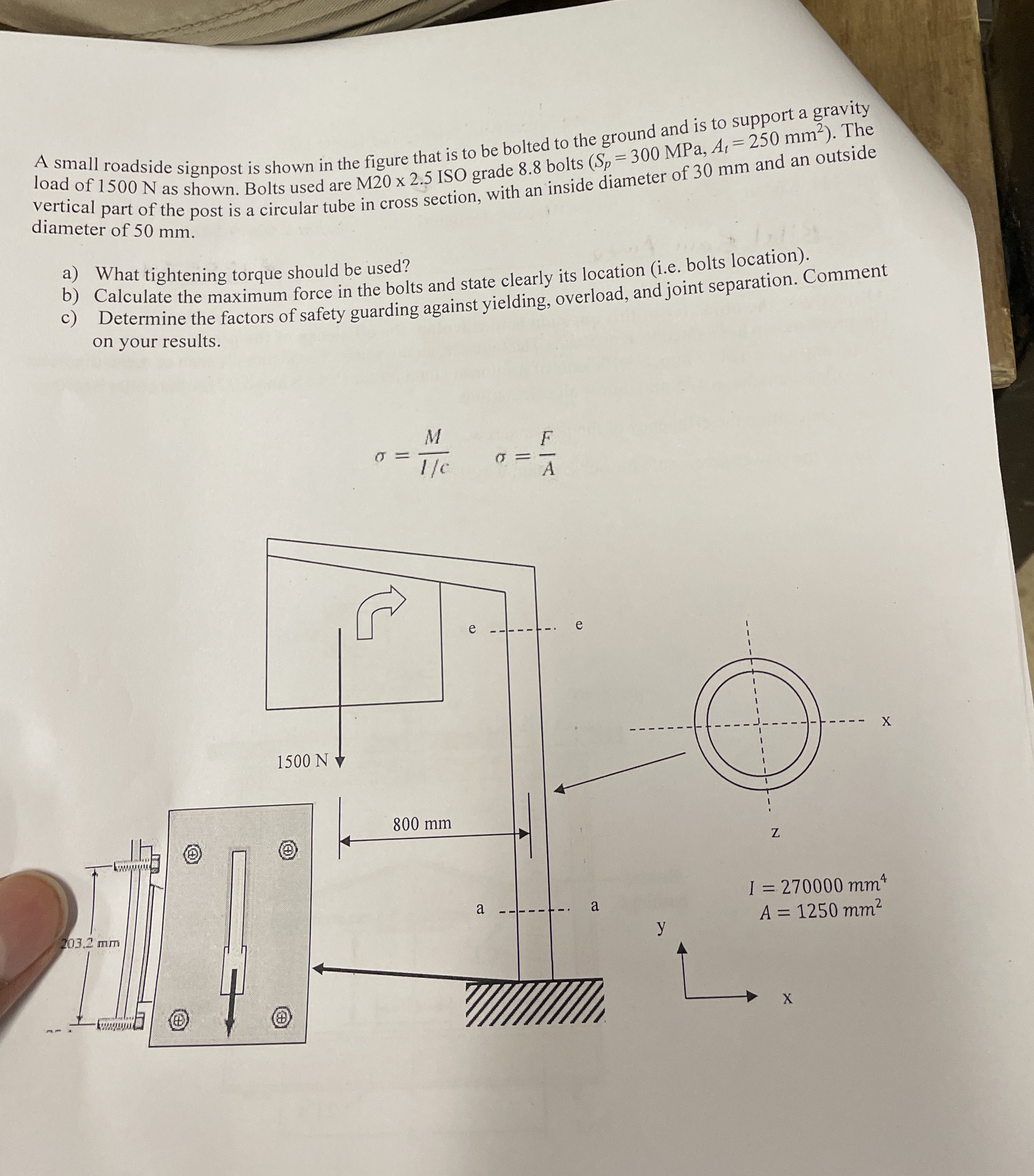 A small roadside signpost is shown in the figure