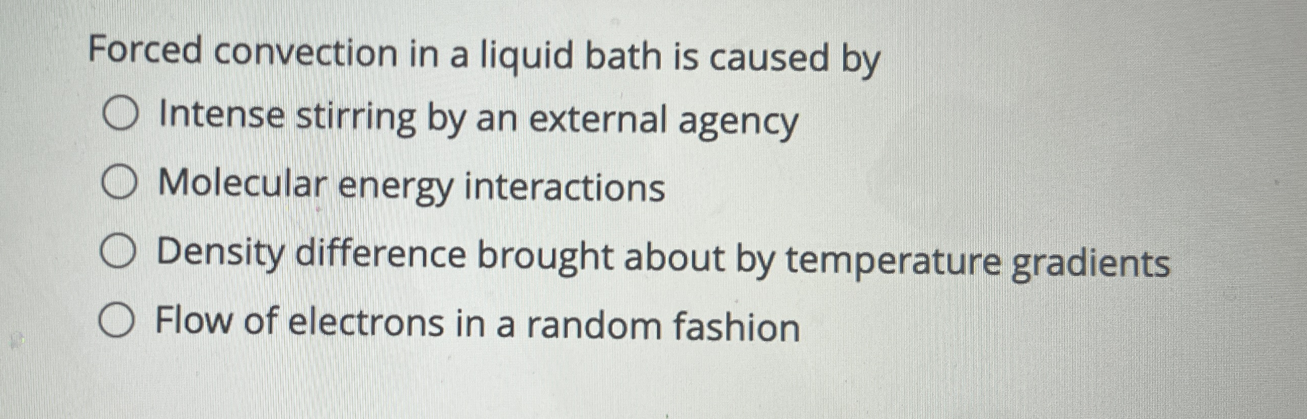 Forced convection in a liquid bath is caused by