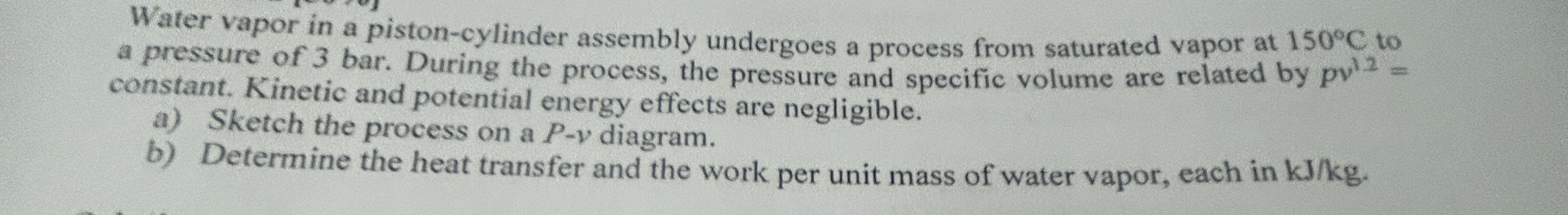 Water vapor in a piston - cylinder assembly