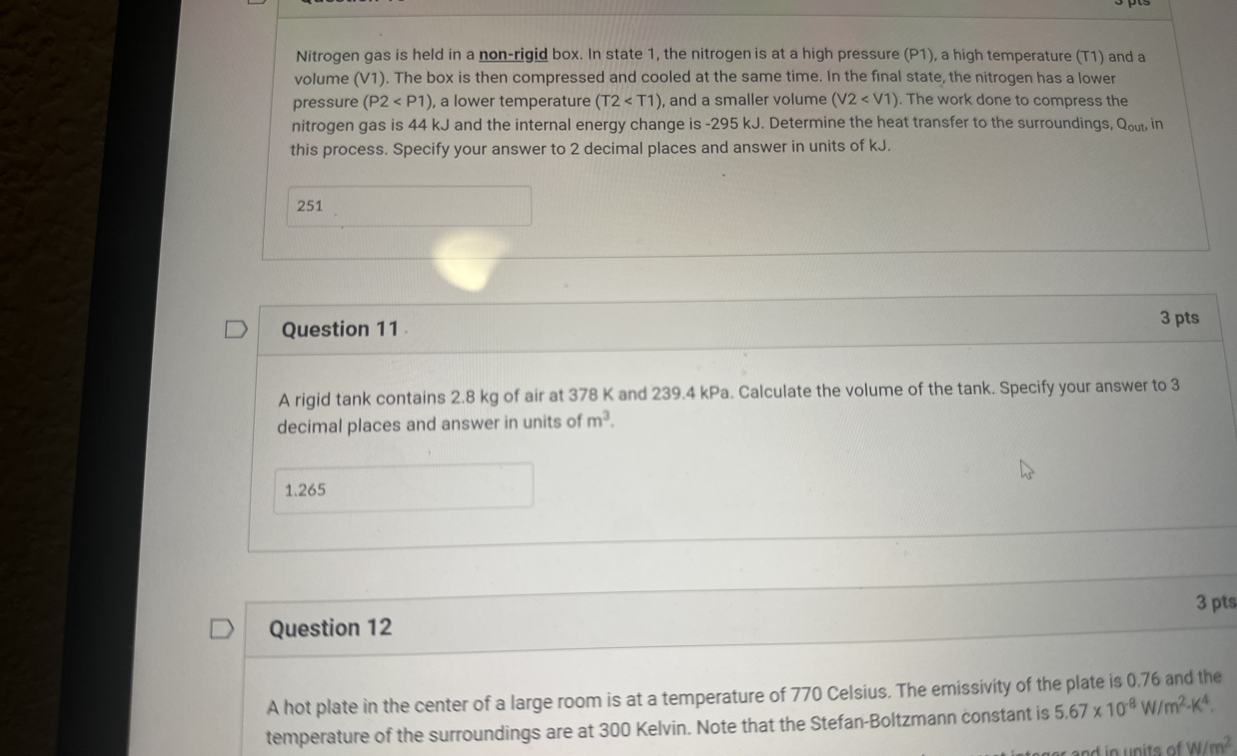 Nitrogen gas is held in a non - rigid box. In