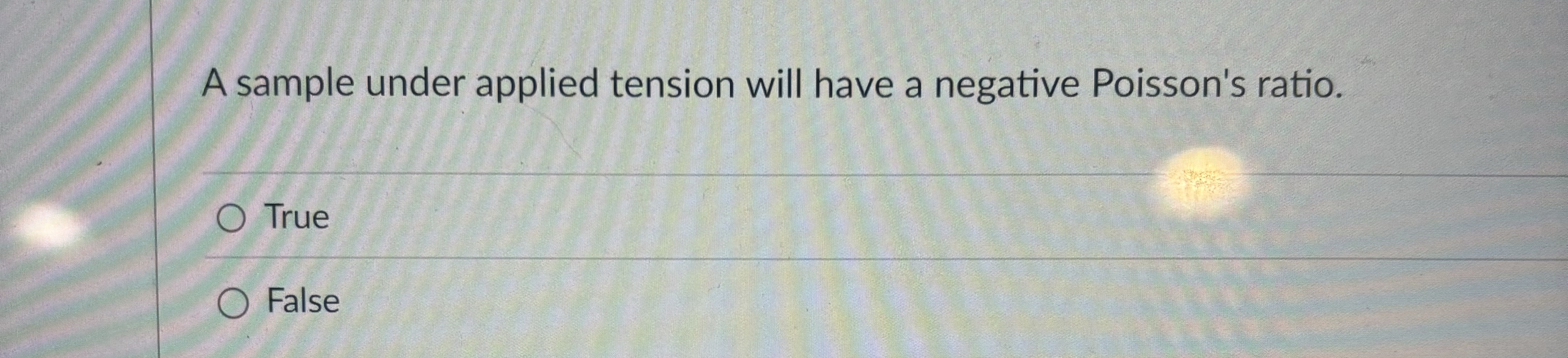A sample under applied tension will have a