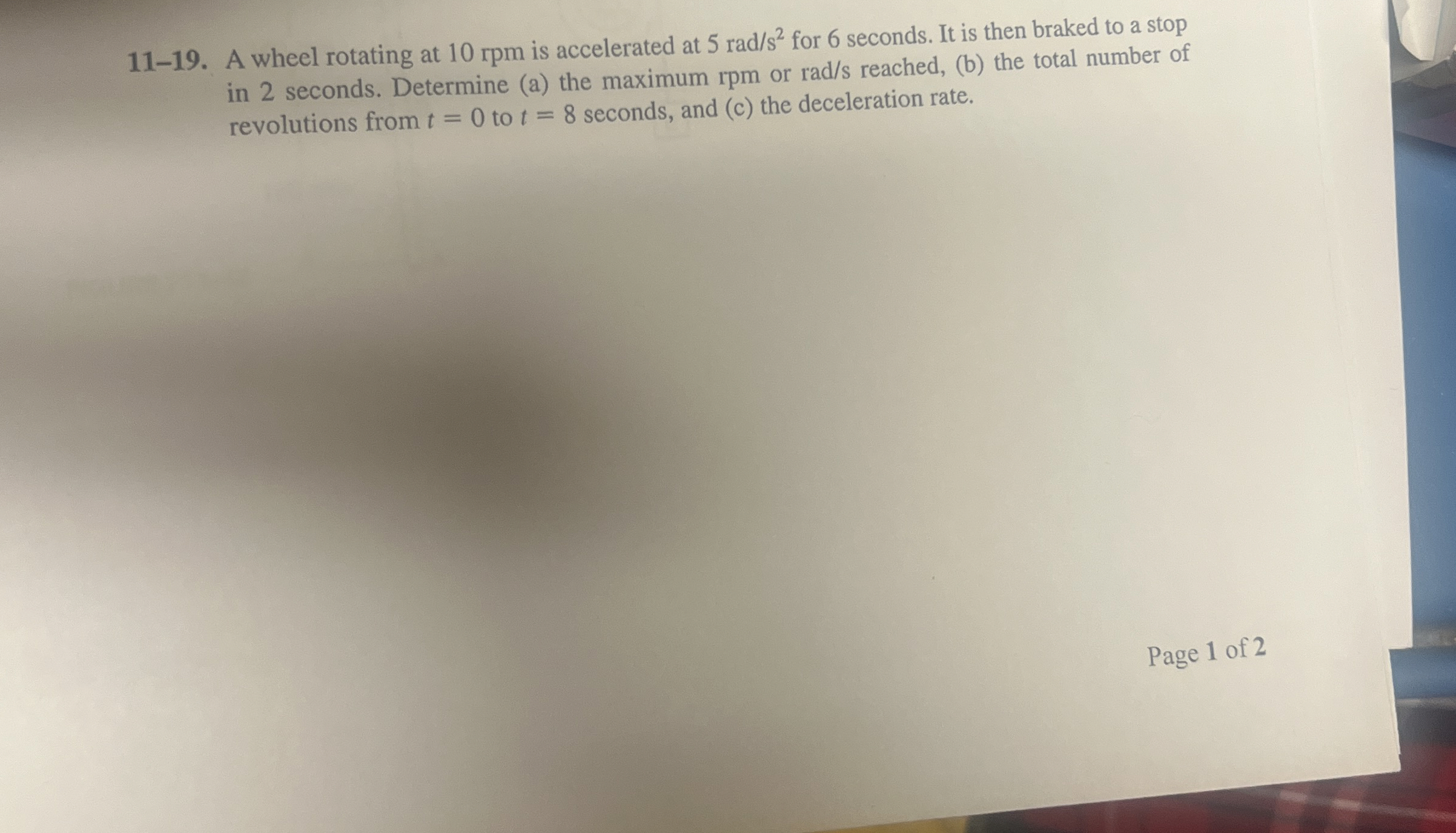 1 1 - 1 9 . A wheel rotating at 1 0 rpm is