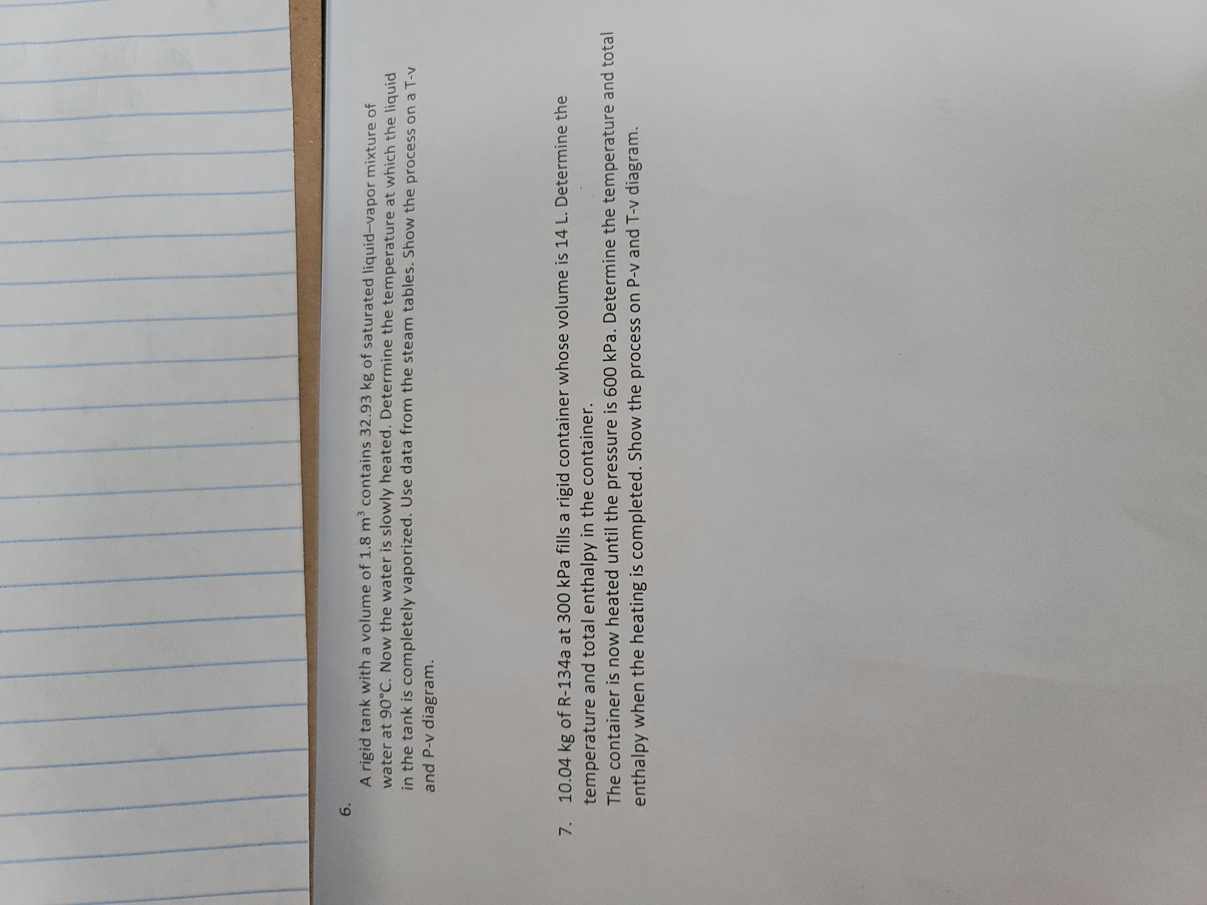 A rigid tank with a volume of 1 . 8 m 3 contains