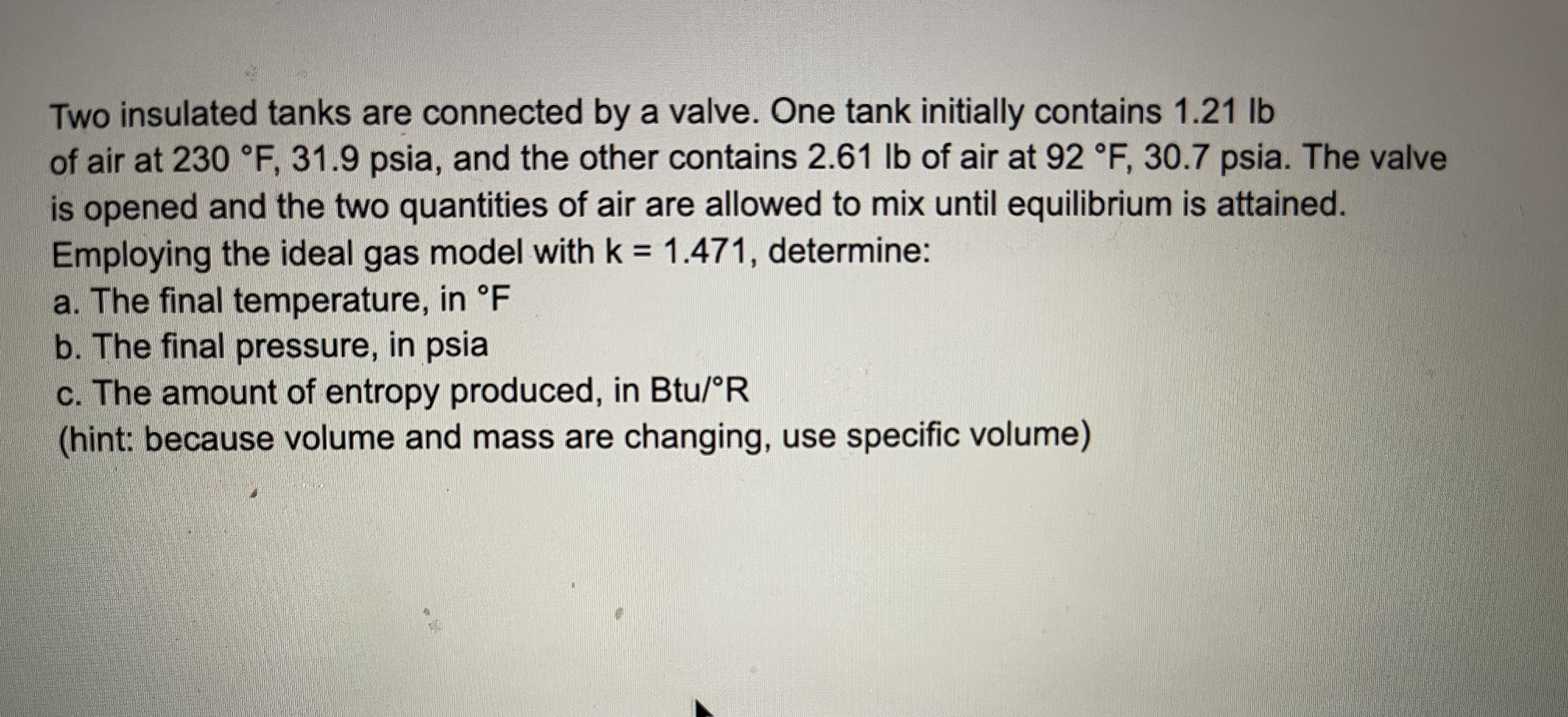 Two insulated tanks are connected by a valve. One