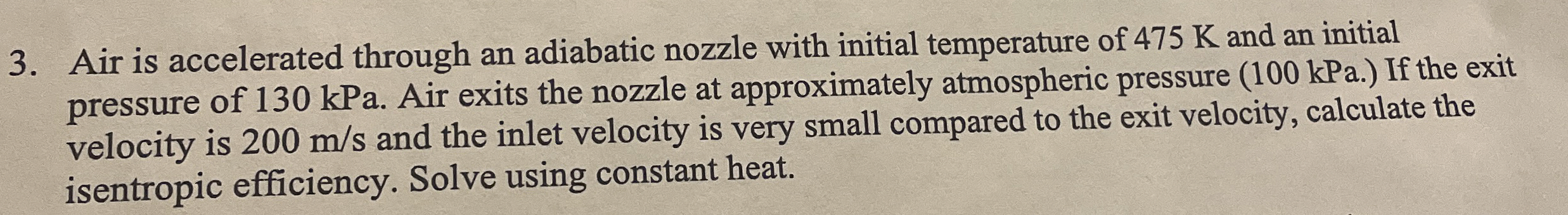 Air is accelerated through an adiabatic nozzle