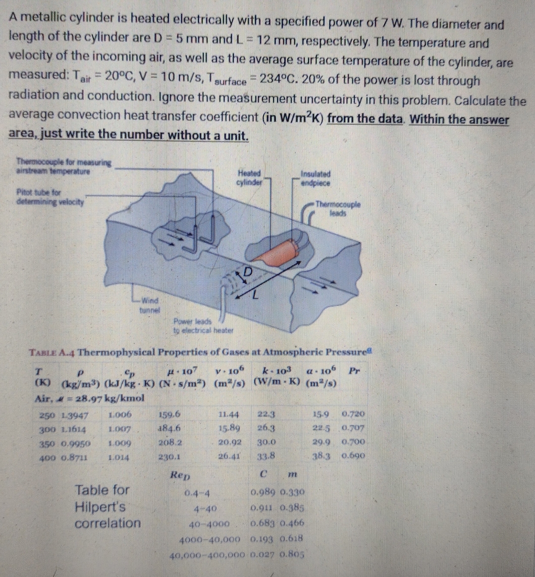 A metallic cylinder is heated electrically with a