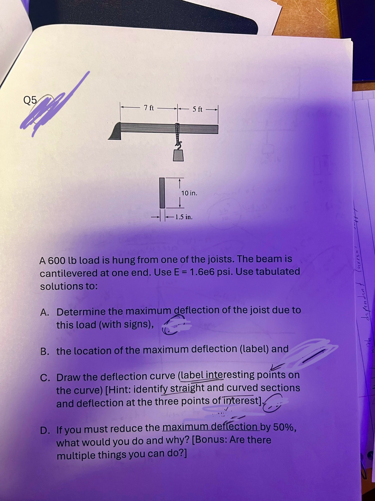 A 6 0 0 lb load is hung from one of the joists.