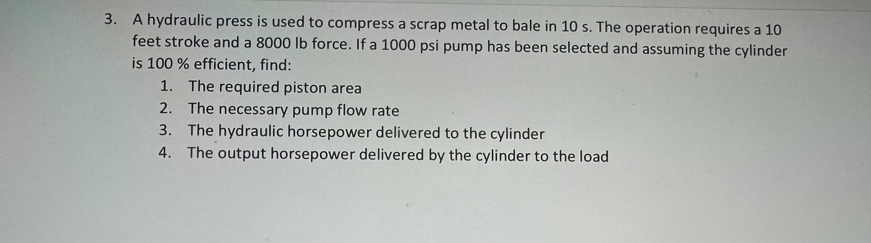 A hydraulic press is used to compress a scrap